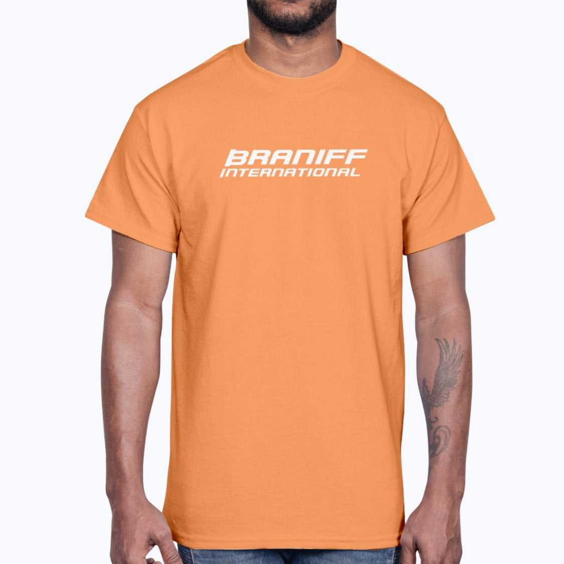 Braniff International Unisex T-Shirt - Tangerine - Model